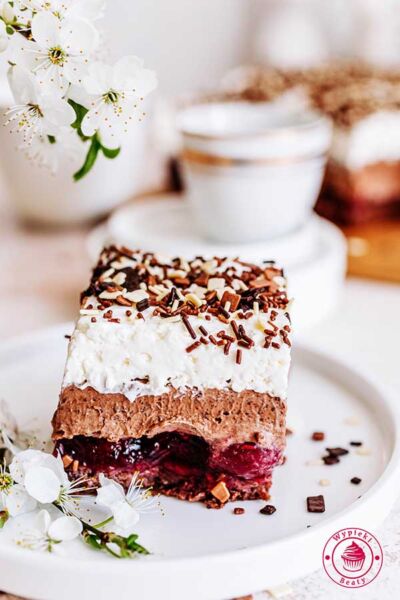 black forest cake with cherries and cream