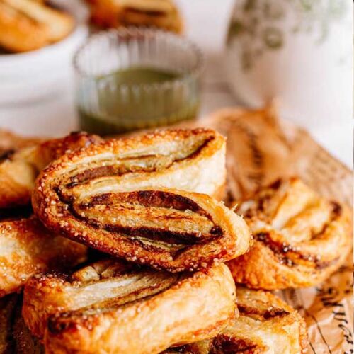 a pile of pastries on a table