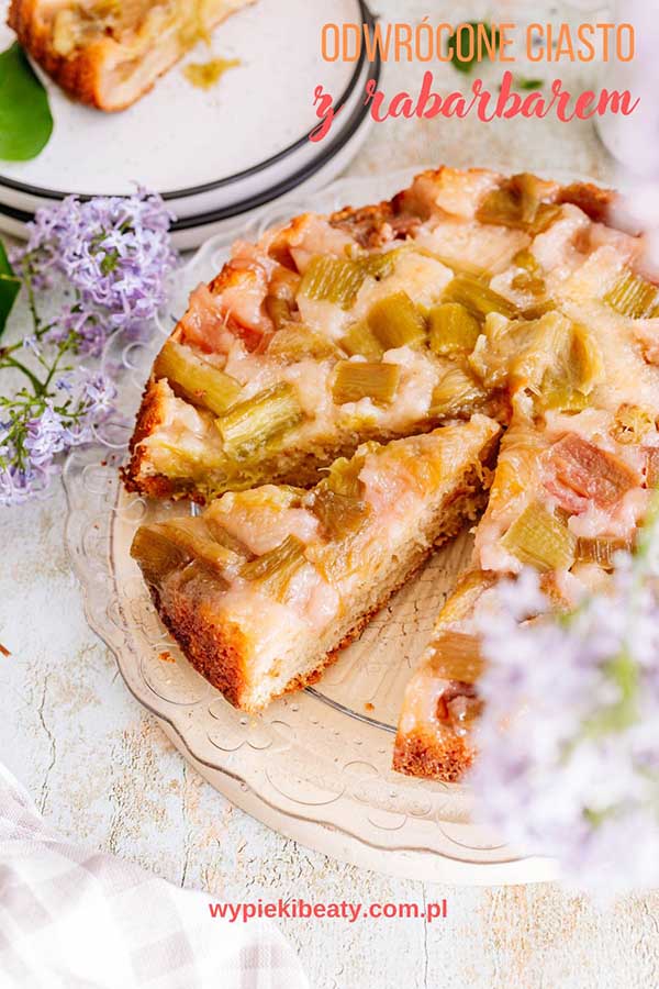 a cake with rhubarb on a plate