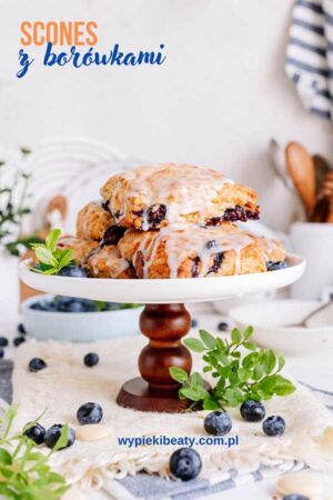 a stack of blueberry scones on a white plate