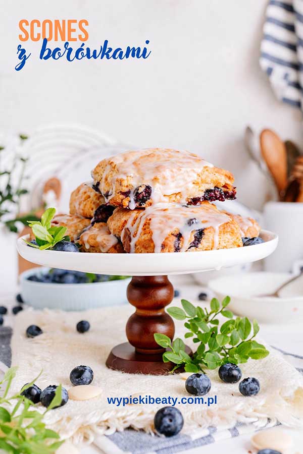a stack of blueberry scones on a white plate