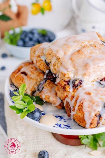 blueberry scones laying on a stand