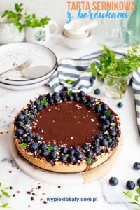 Moist Cinnamon Cake view of the tart with chocolate glaze and blueberries