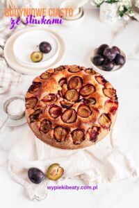 Louise Cake with Plums pudding cake with plums top view