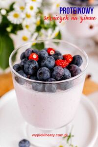 Protein Banana Cake Close-up of a raspberry no-bake cottage cheese cheesecake in a dessert cup.