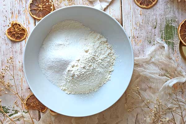 Pieczone oponki pomarańczowe suche składniki na oponki pomarańczowe pieczone w piekarniku