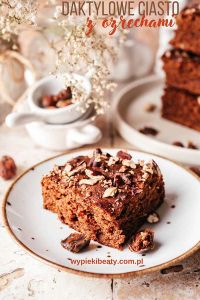 Protein Banana Cake Date cake with nuts on a plate